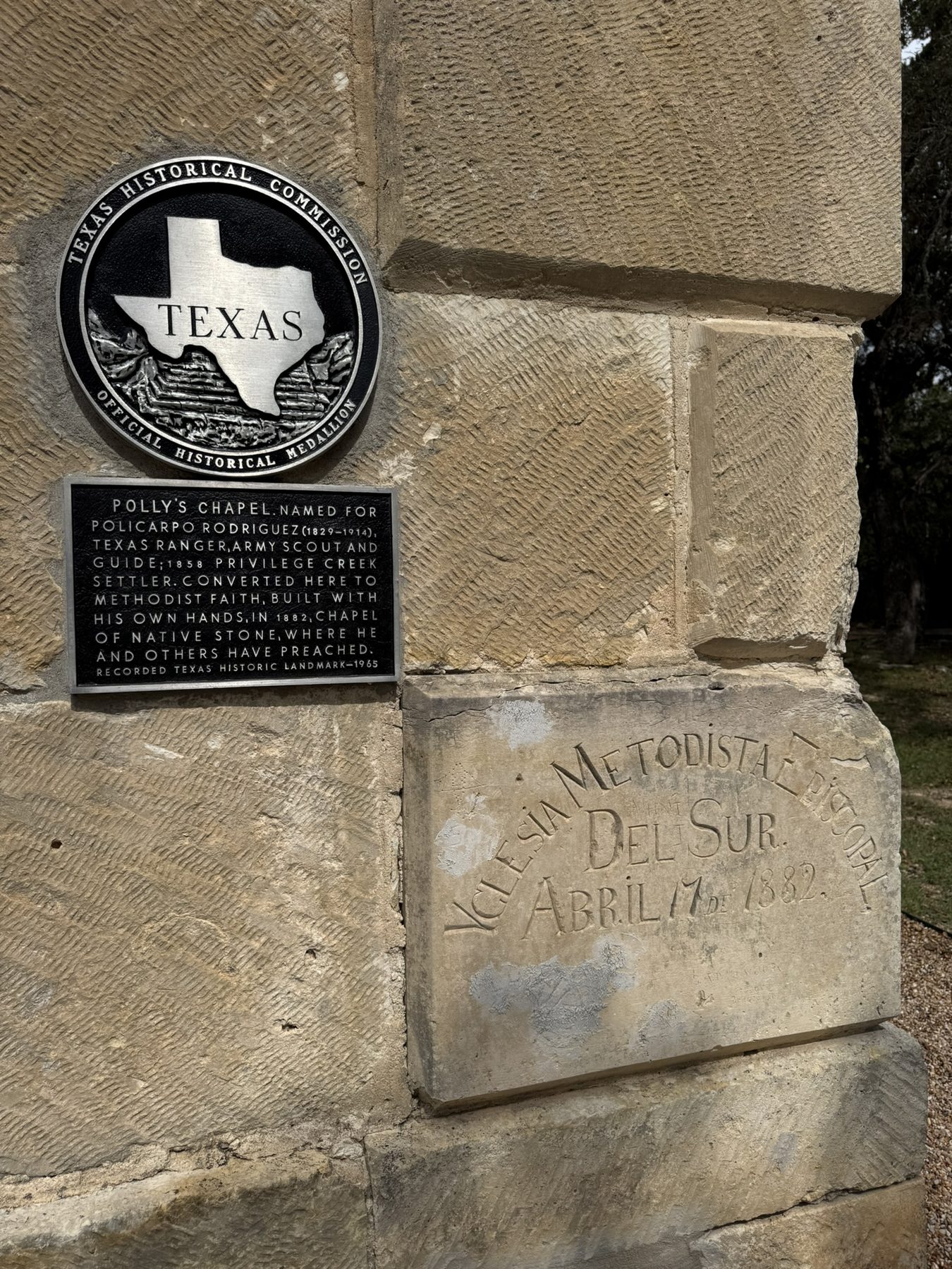 The Texas Historical Commission medallion beside the 1882 cornerstone