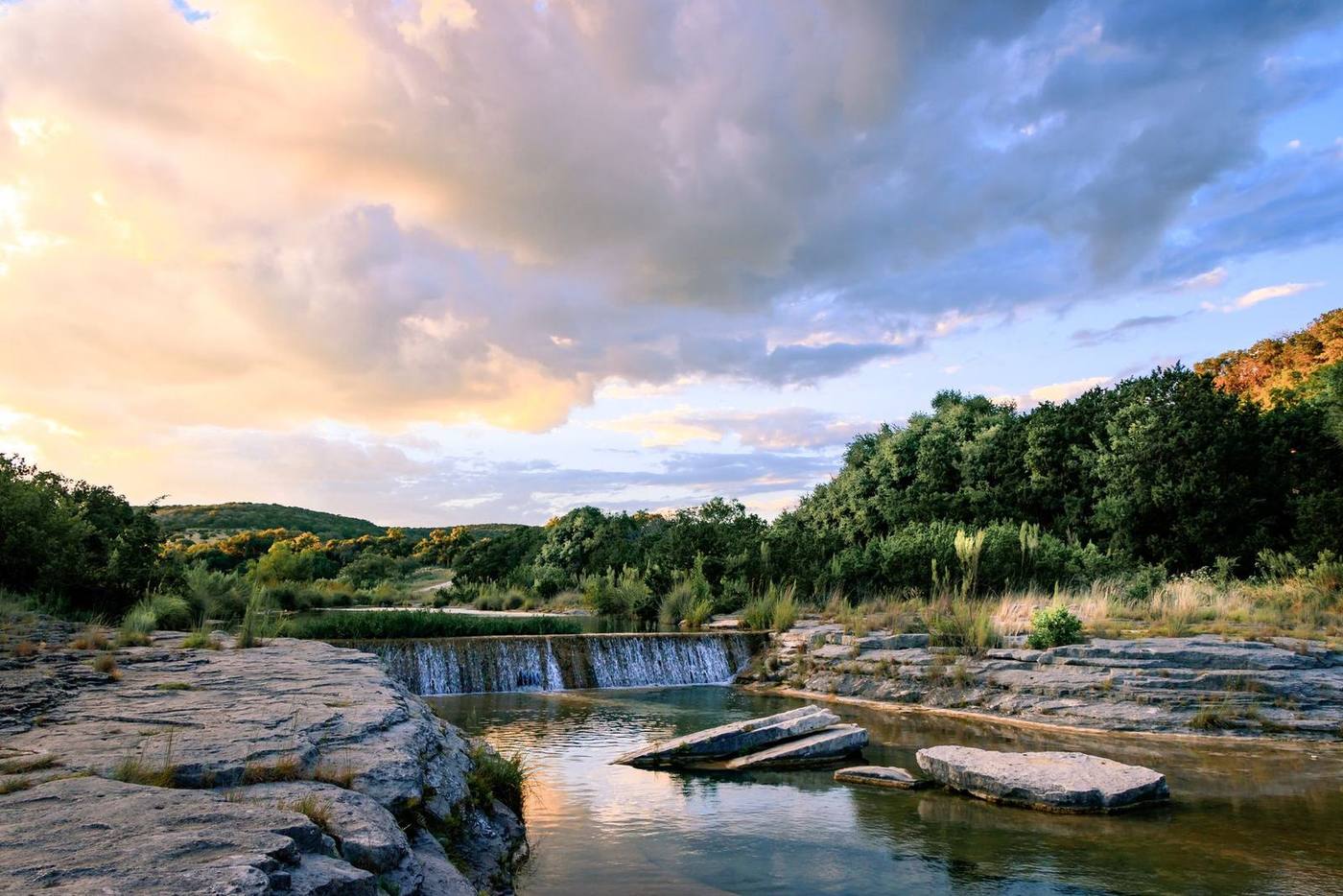 A Hill Country river between cypress banks